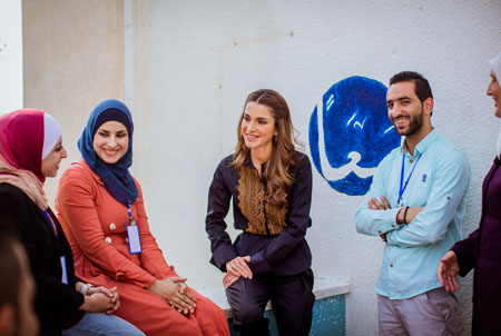 Her Majesty Queen Rania meets with members of the Jerasa Charitable Society for Women in Jerash during a visit on Wednesday (Photo courtesy of Royal Court)